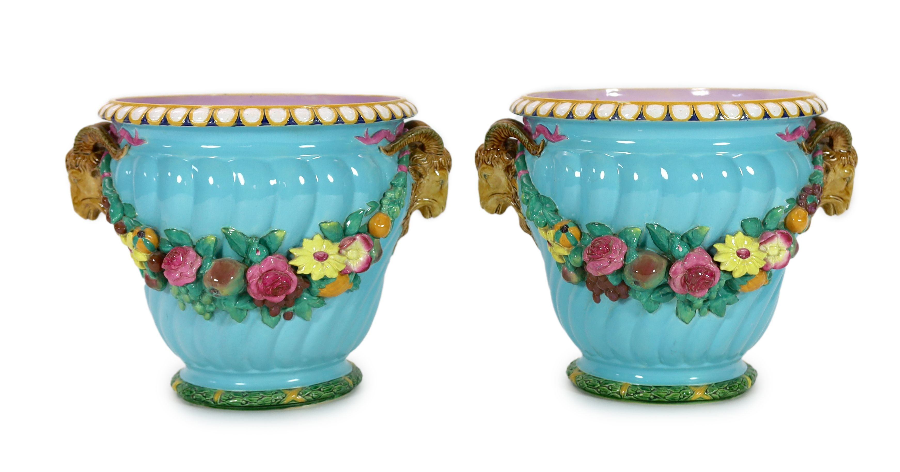 A pair of Minton classical revival majolica jardinieres, late 19th century, 37cm high, restored